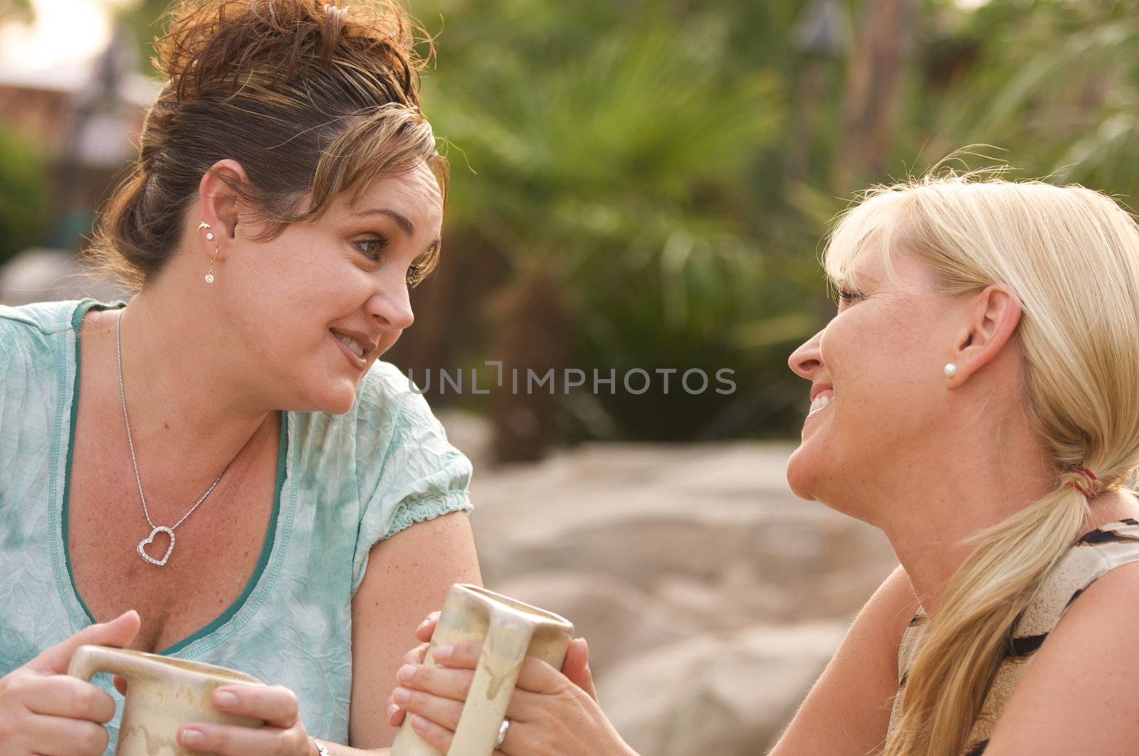 Girlfriends Enjoy A Conversation by Feverpitched