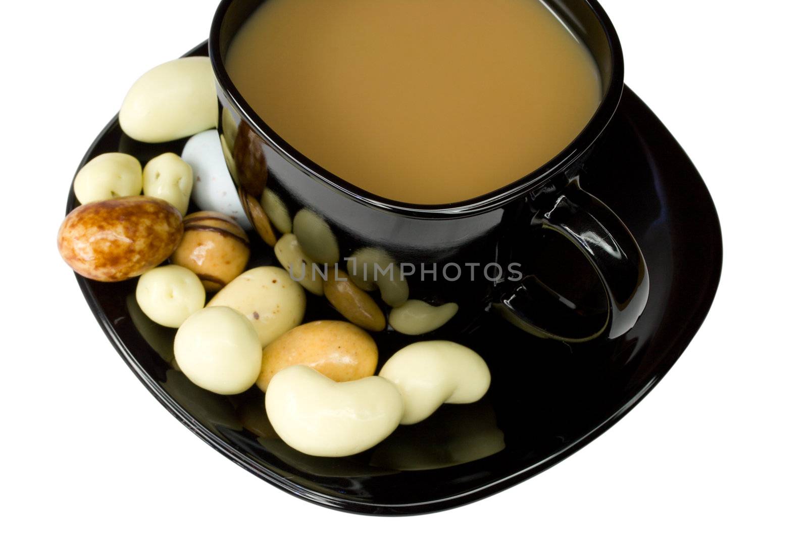 black coffee cup with milk and candies by Alekcey