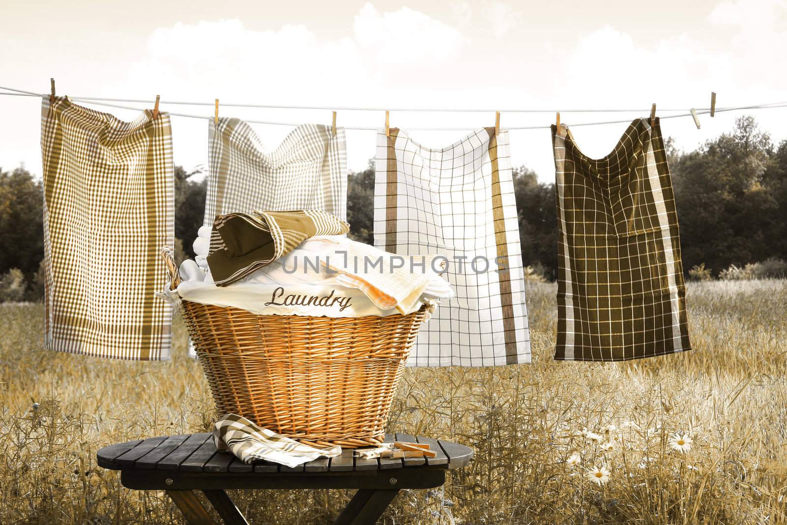 Towels drying on the clothesline by Sandralise