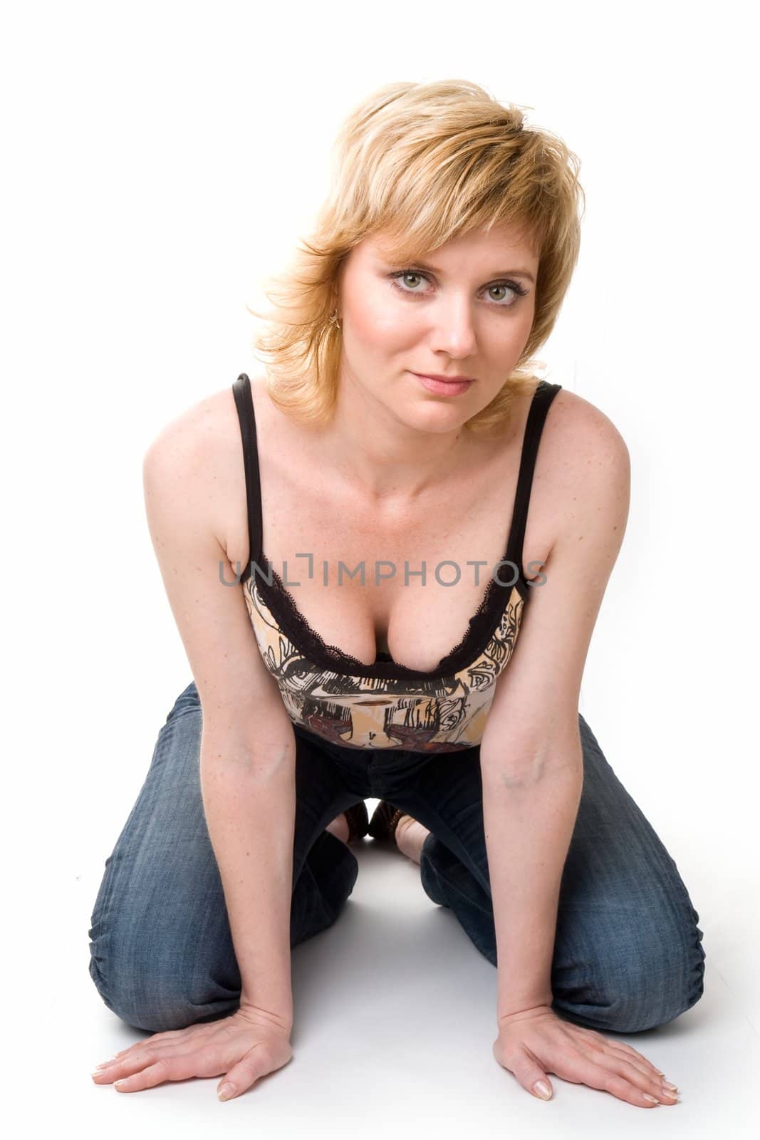beautiful girl sits on a white background
