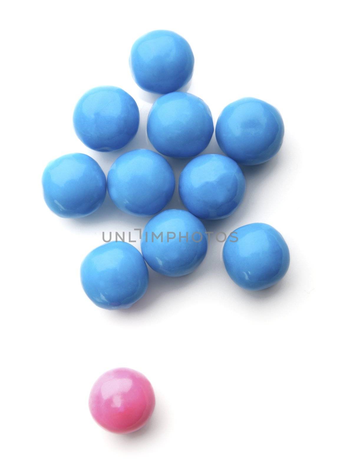 pink and blue bubble gum balls isolated on white - concept for females versus males and sex discrimination