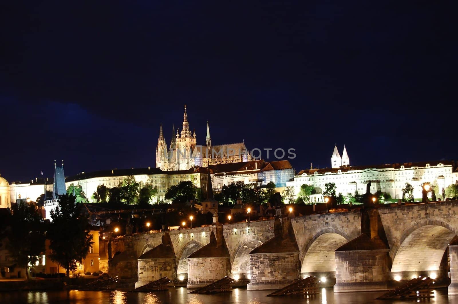 Colorful Charles bridge in Prague by night