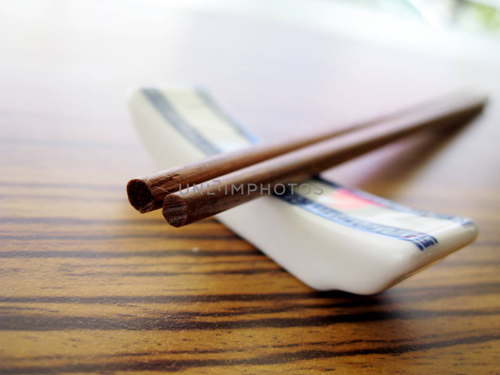 close up for a pair of wooden chopstick, Chinese culture tools for eating