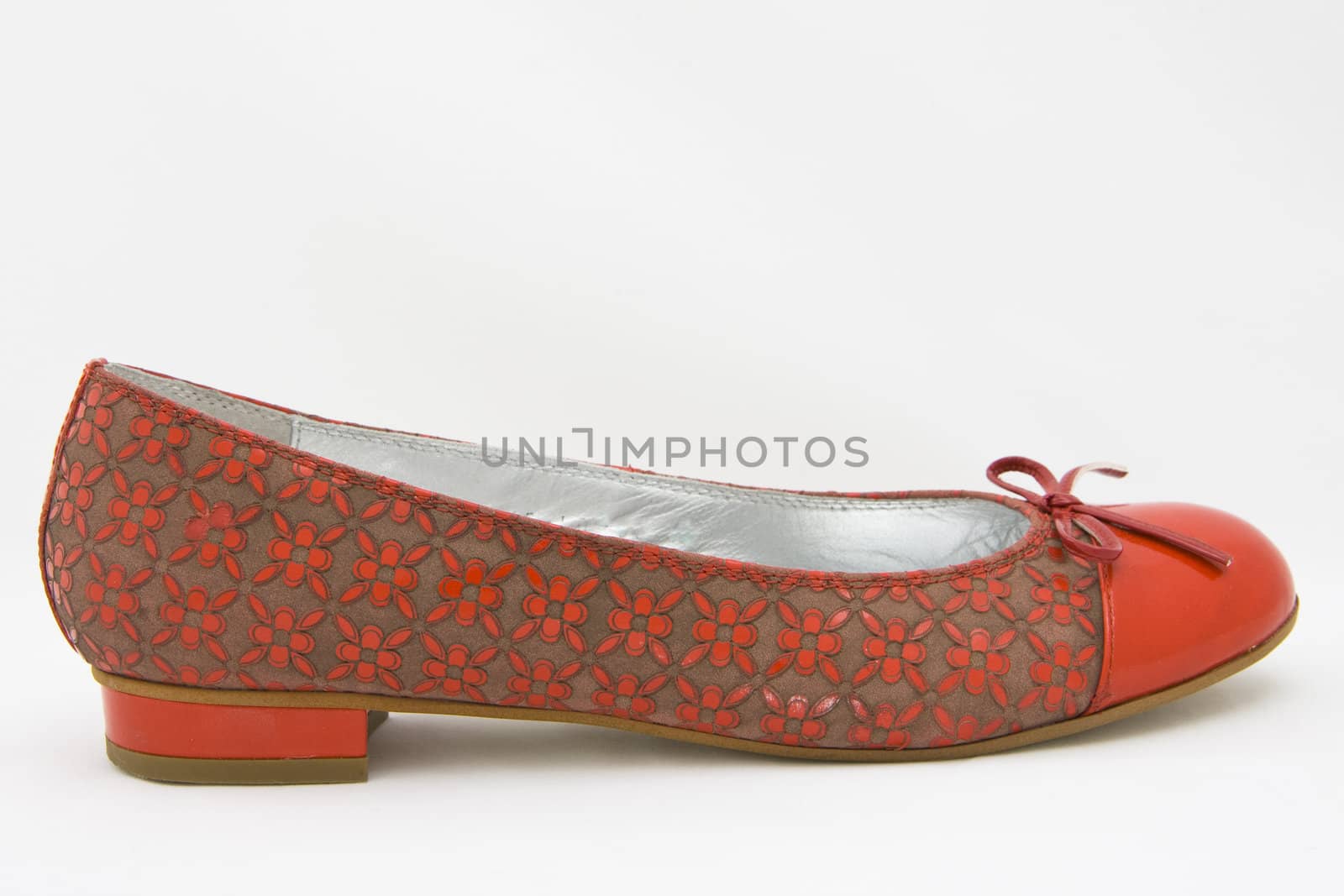 red woman shoe on white background