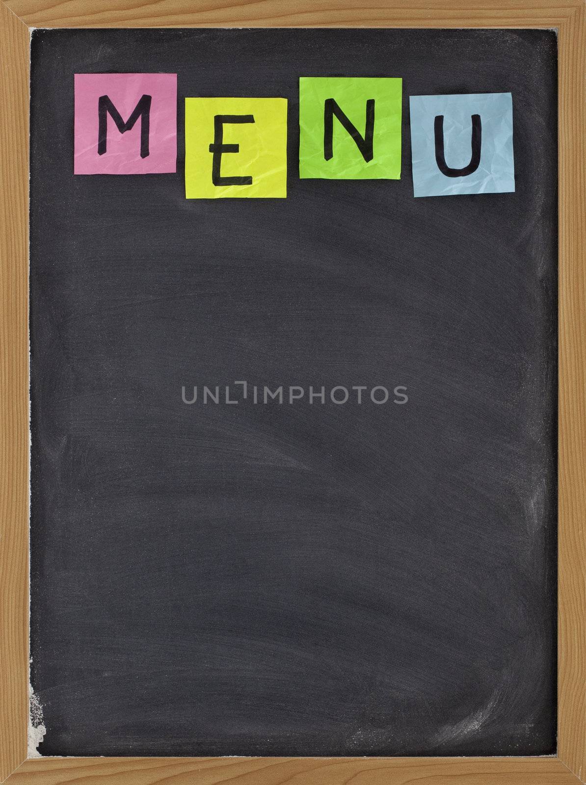 blank restaurant menu - sticky note title on blackboard with white chalk smudges