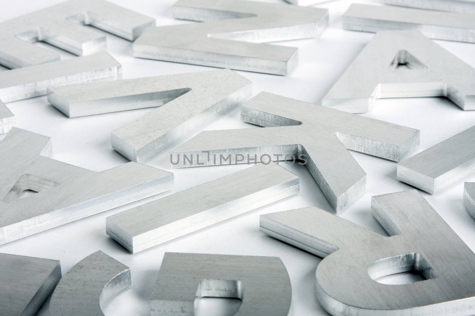 Stylish letters cut out of polished steel