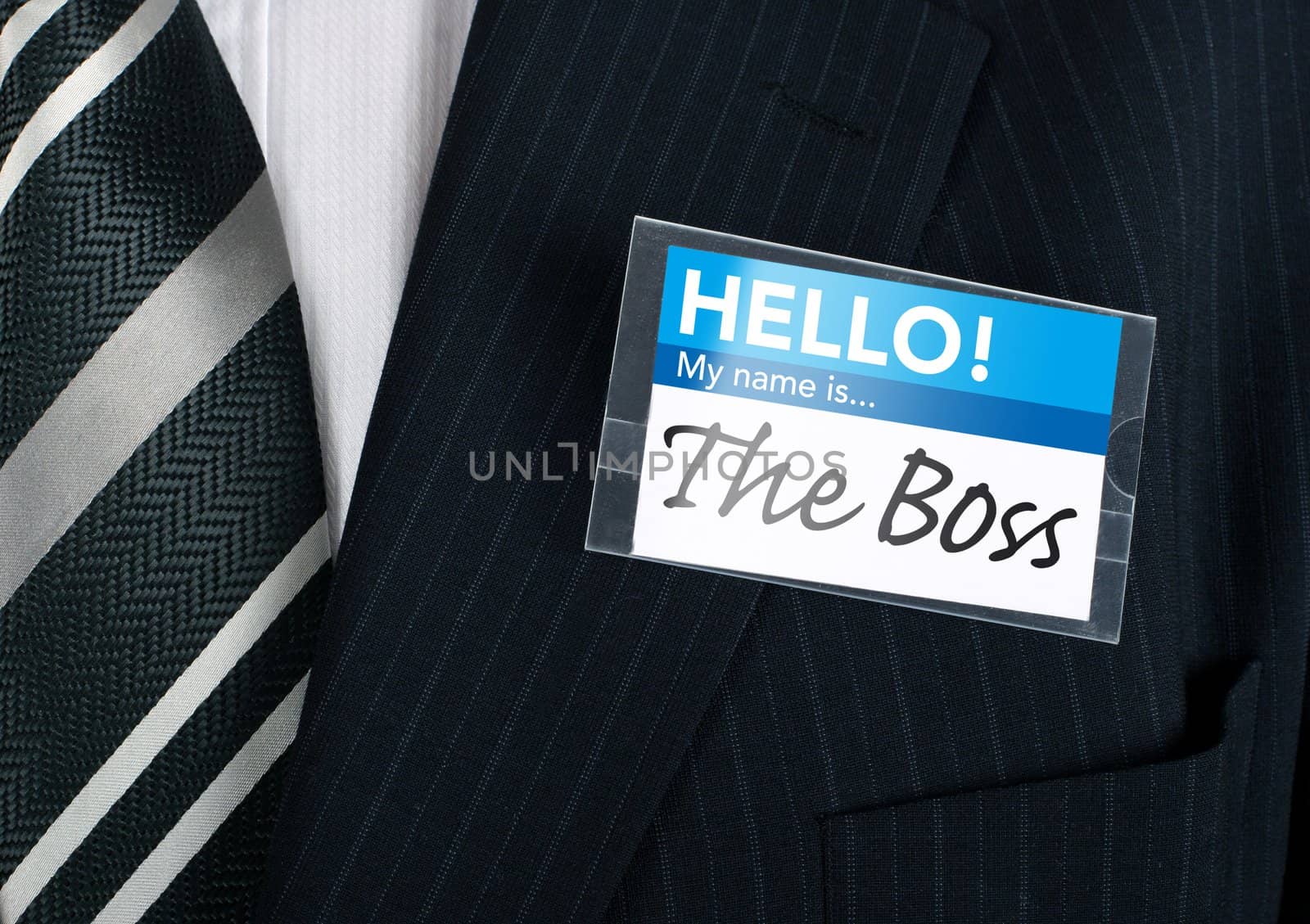 Well dressed businessman claiming to be the boss