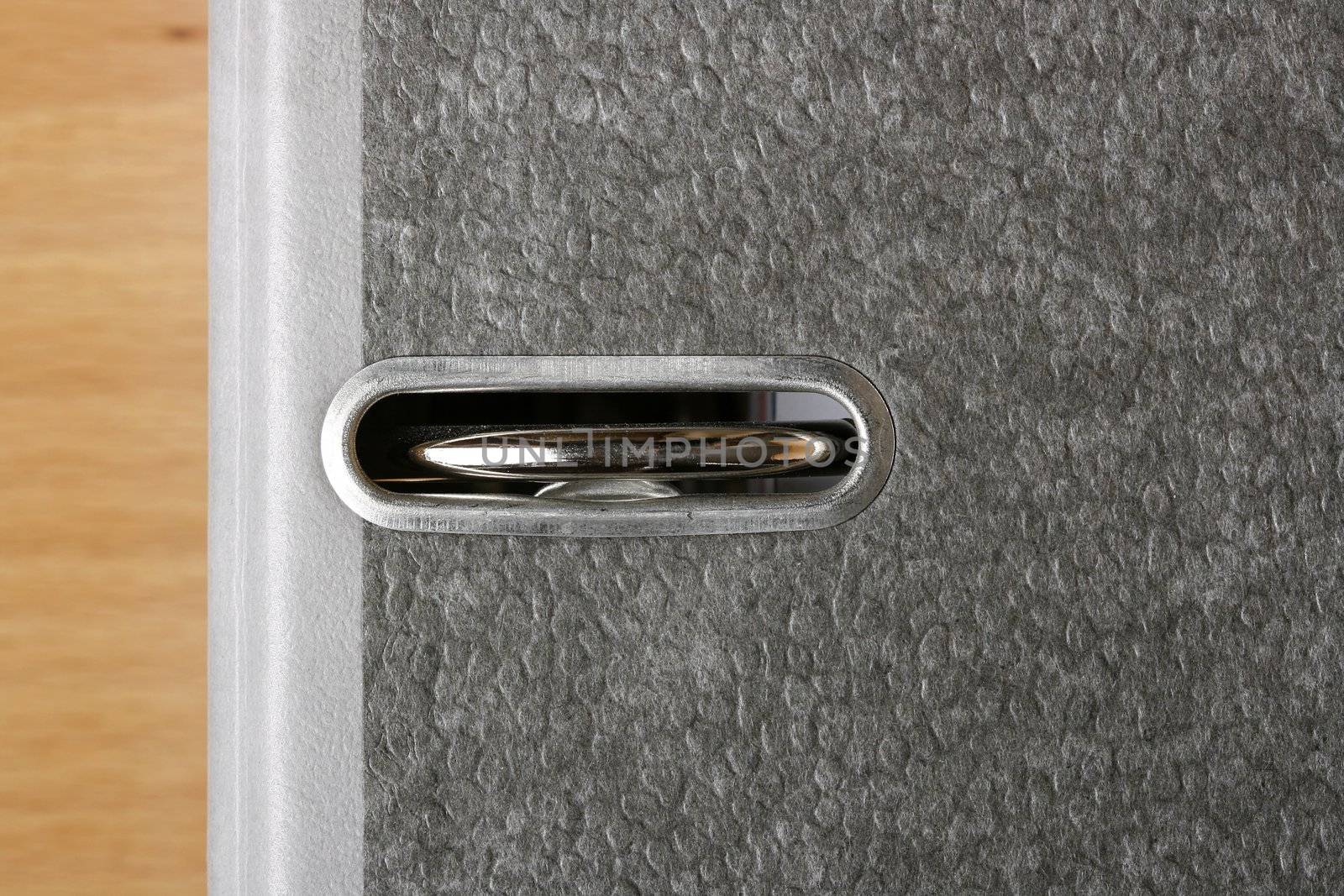 Close-up of a ring binder full of organized files