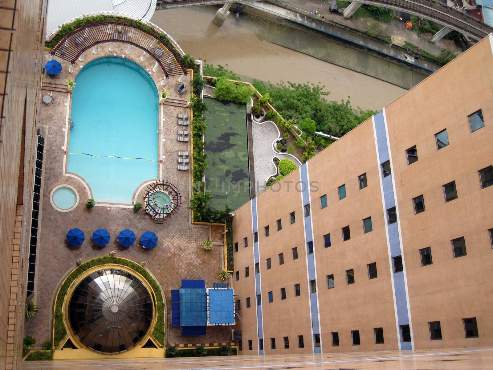 a top view of a swimming pool in a resort