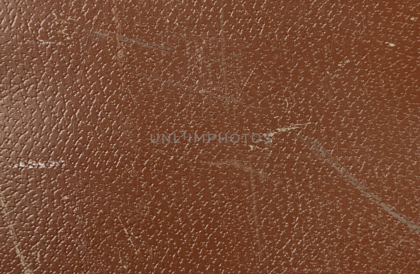 Brown leather texture with visible wear and tear