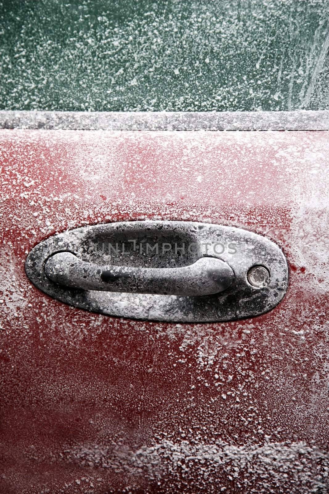 Frozen car after a winter blizzard with copy space for text