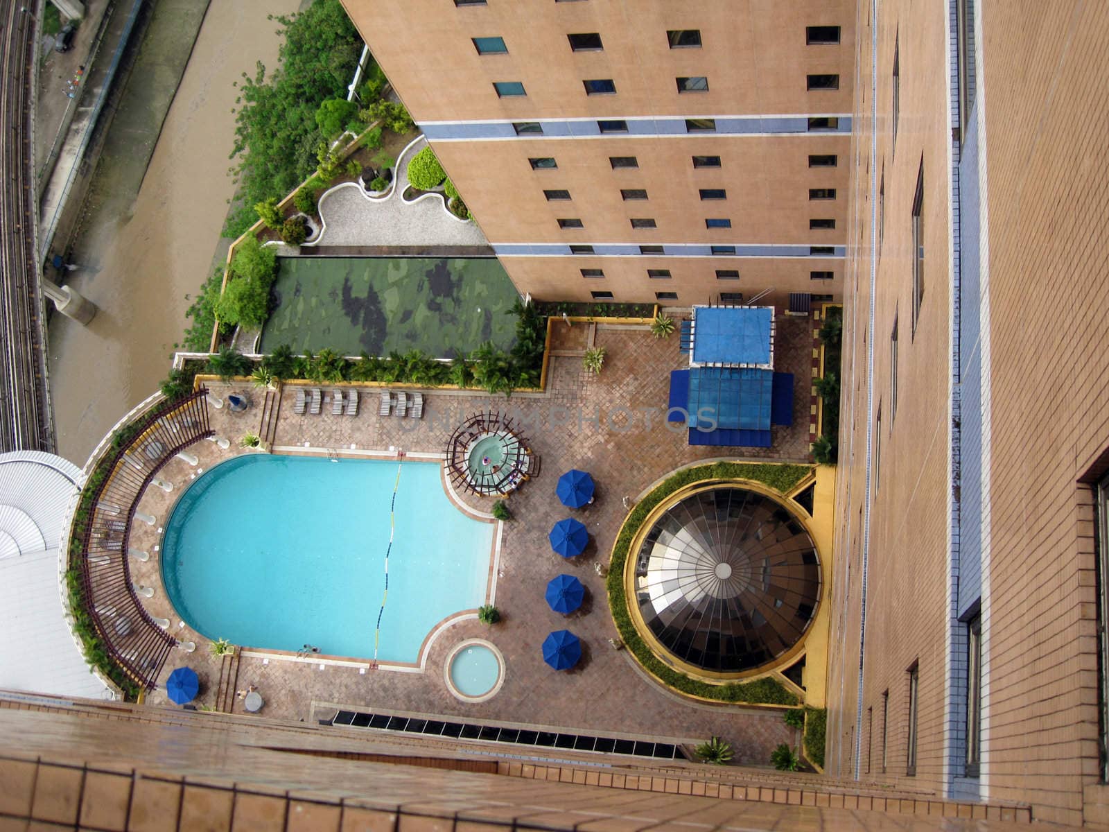 a top view of a swimming pool in a resort