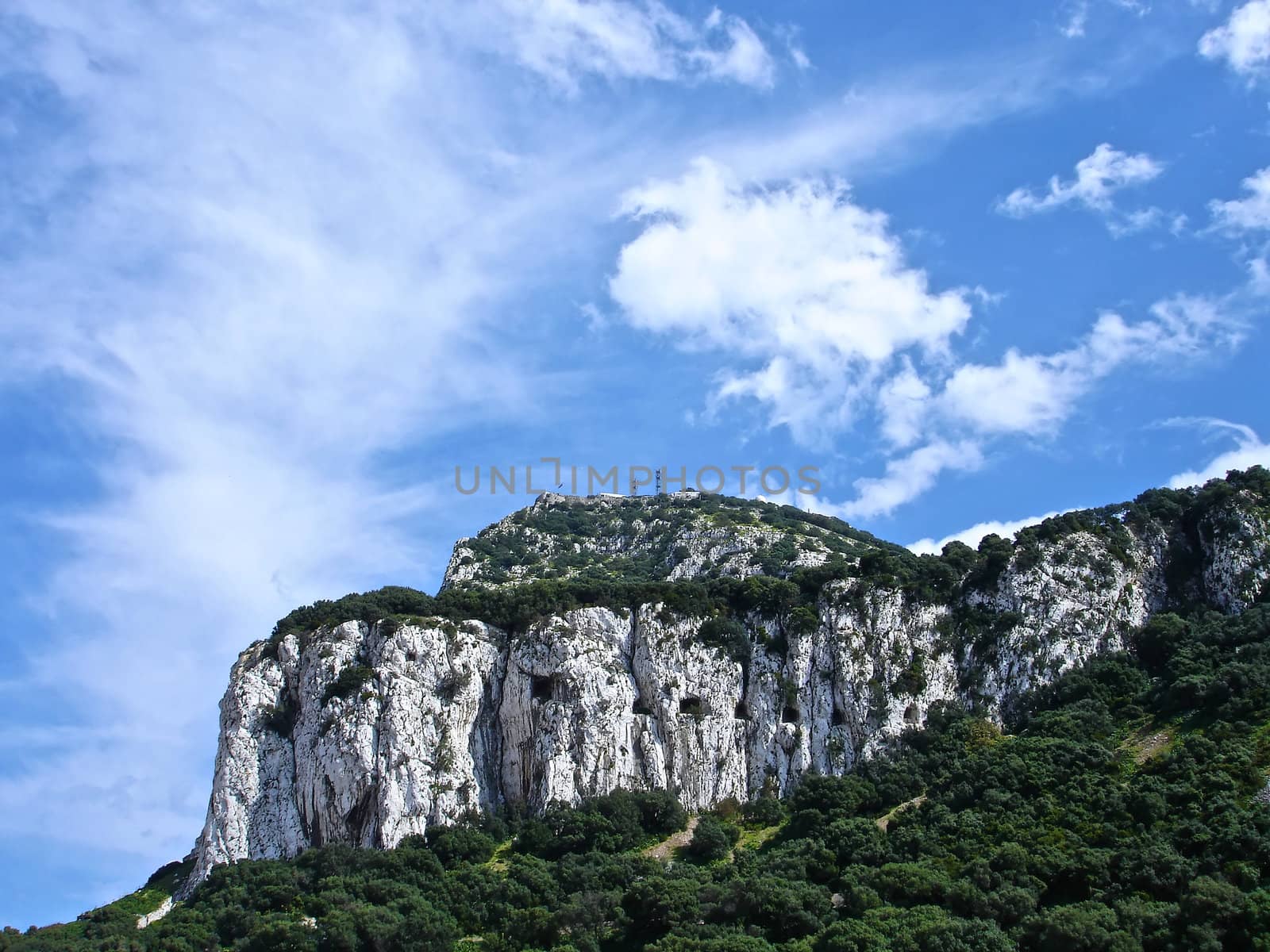 the rock of Gibraltar, you can see the tunnels drilled into the mountain for the guns