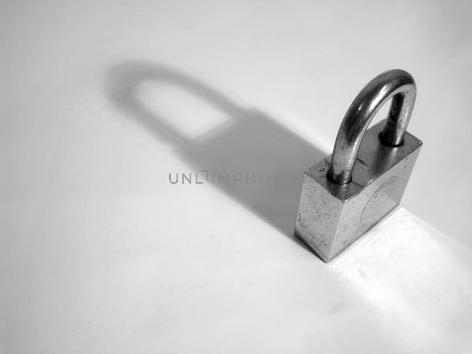 a close up for a padlock metaphors for security