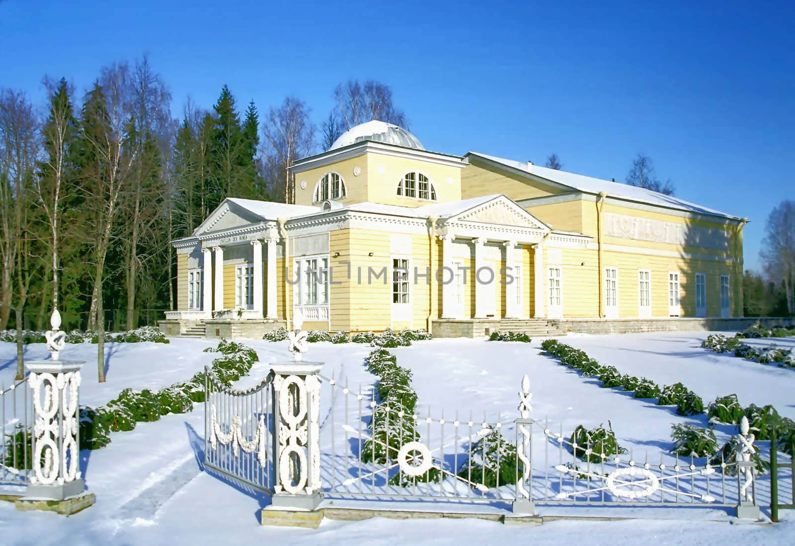 Wooden classical building in winter sunny day