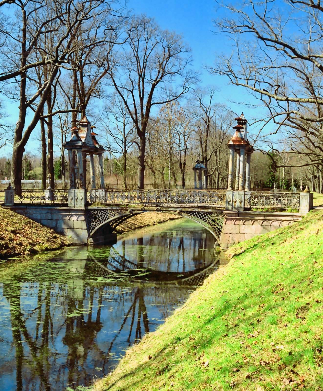 Old metal brige over channel in spring park