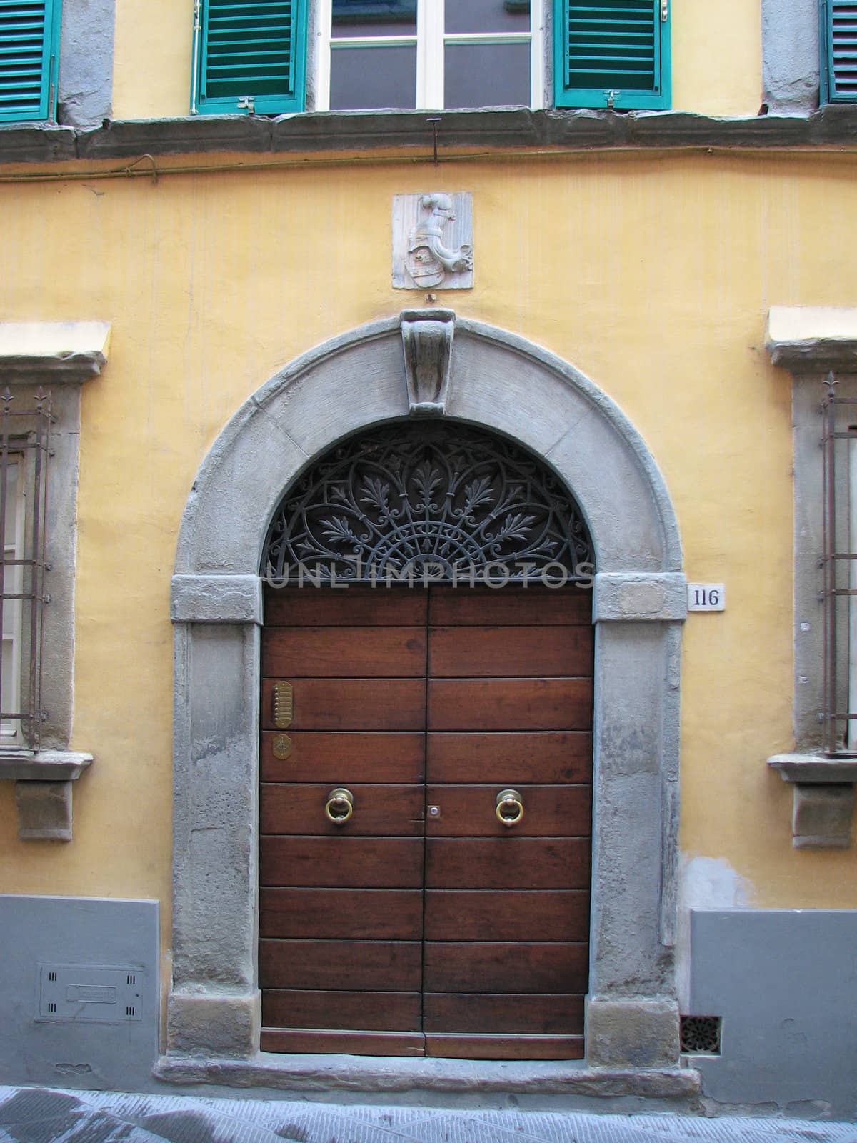 Wooden doors in old building in Italy