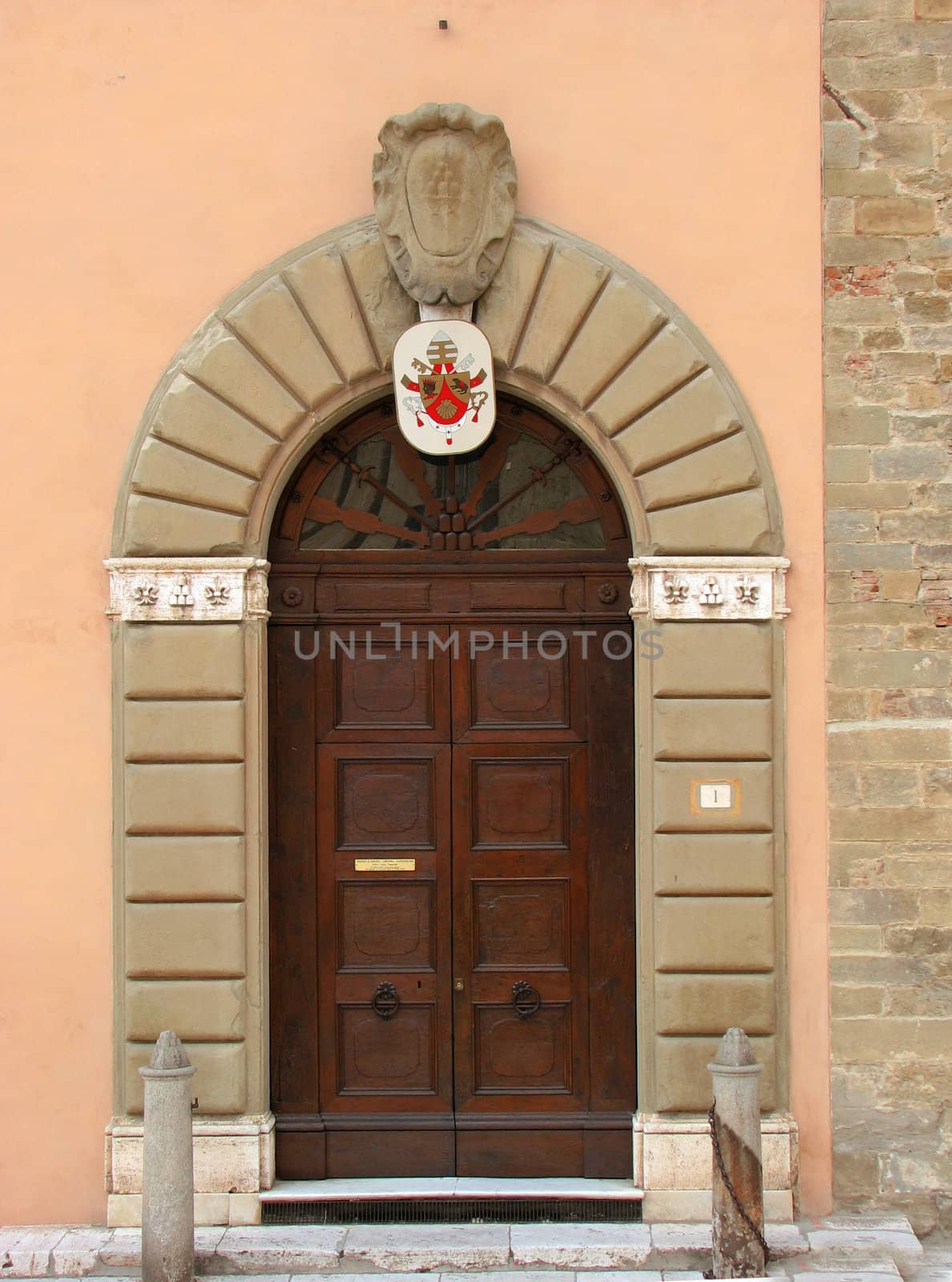 Wooden doors in old building in italy