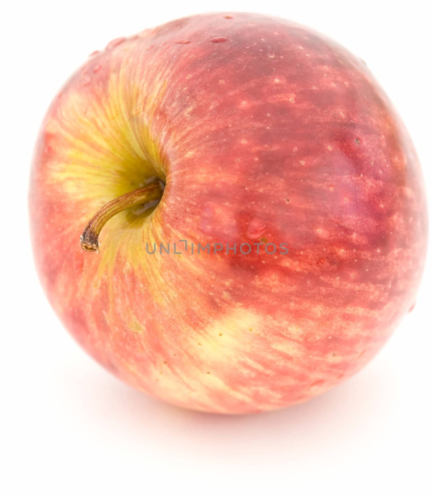 Juicy red apple on a white background