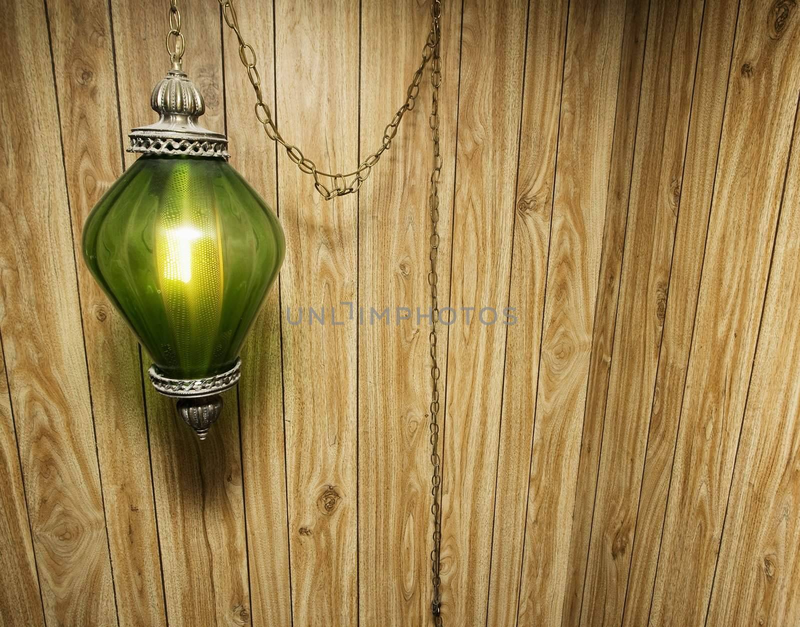 Wood Paneling and Hanging Lamp by Creatista