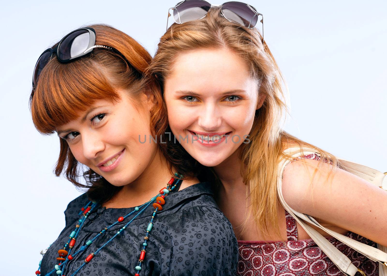 Beautiful young women posing and smiling