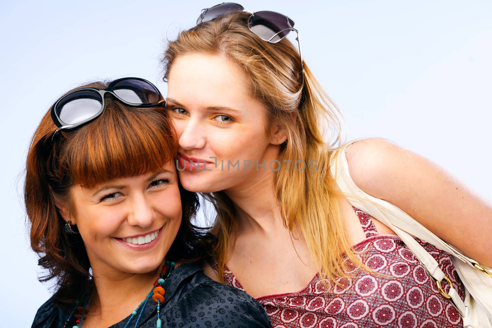 Beautiful young women posing and smiling