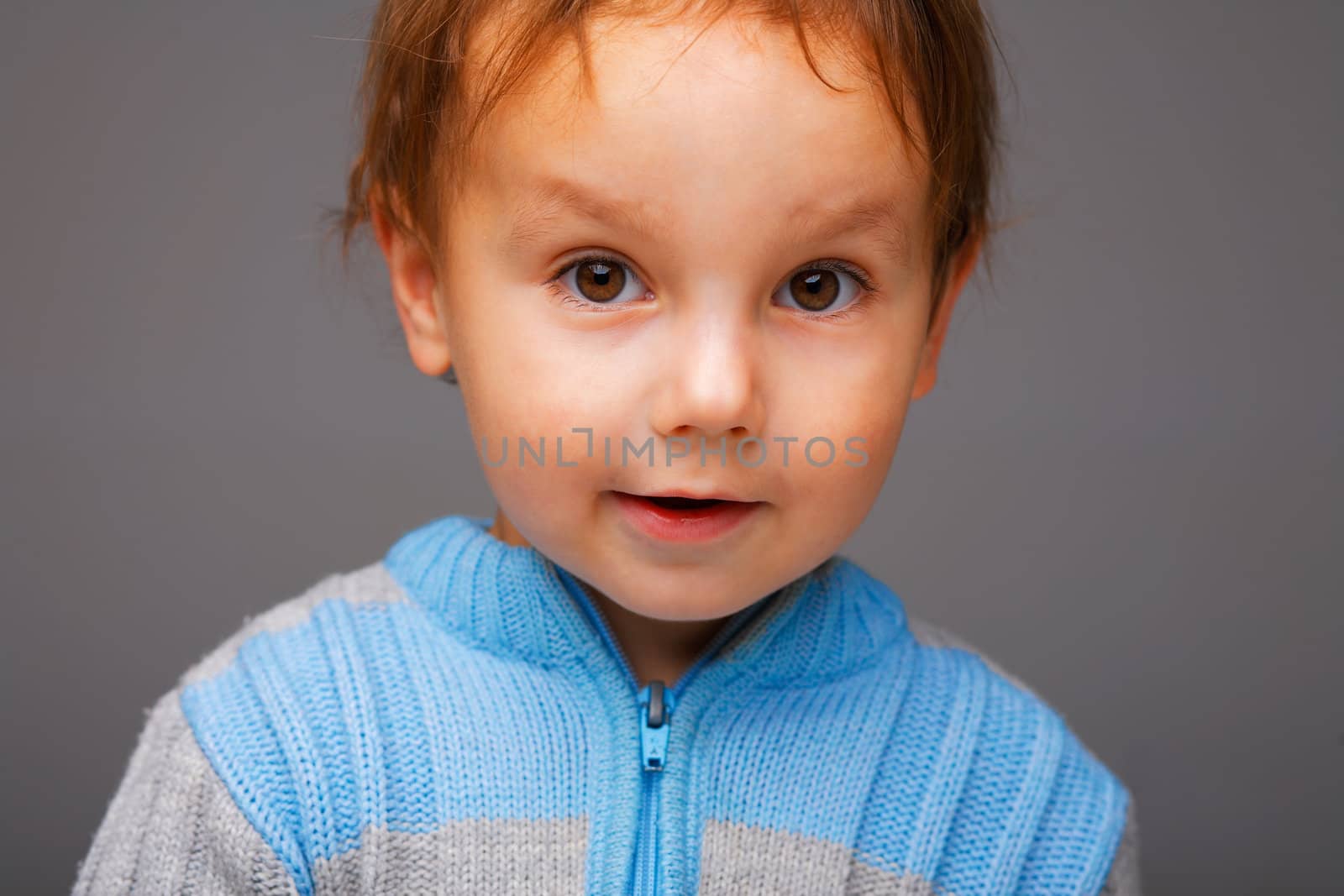 Closeup portrait of a little smiling boy