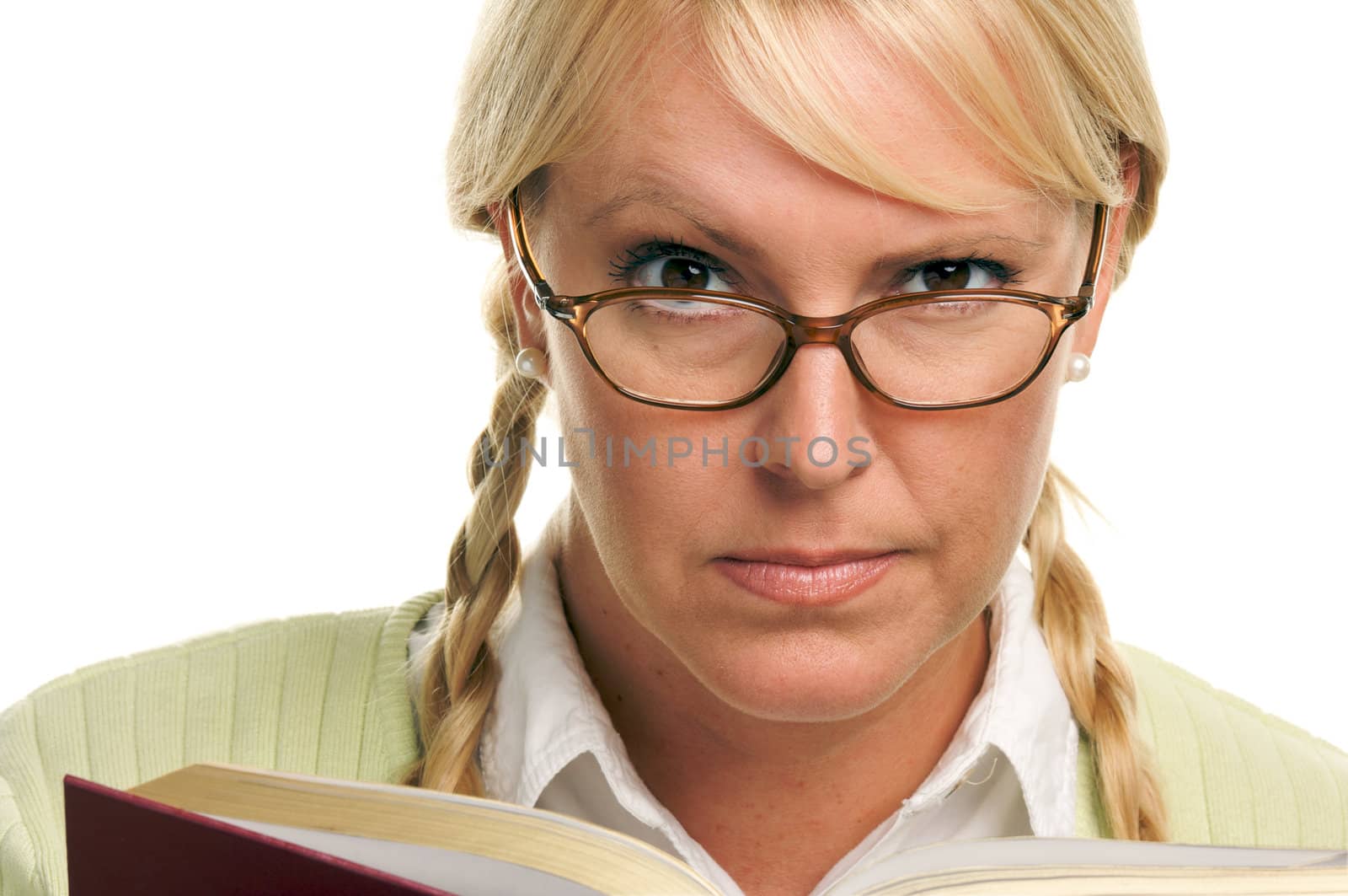 Serious Female with Ponytails and Book isolated on a White Background.
