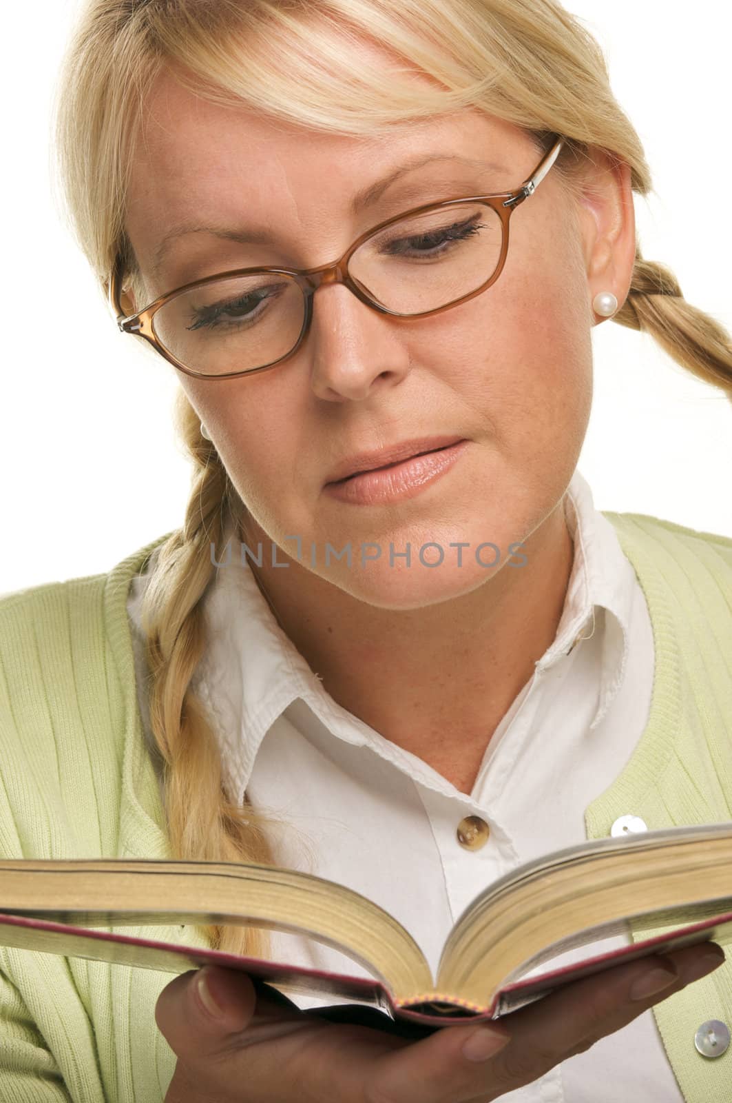 Female With Ponytails Reads Her Book isolated on a White Background.