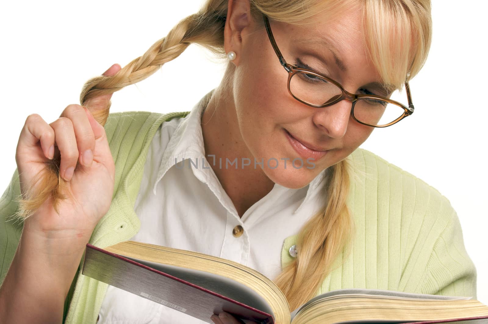 Female With Ponytails Reads Her Book isolated on a White Background.