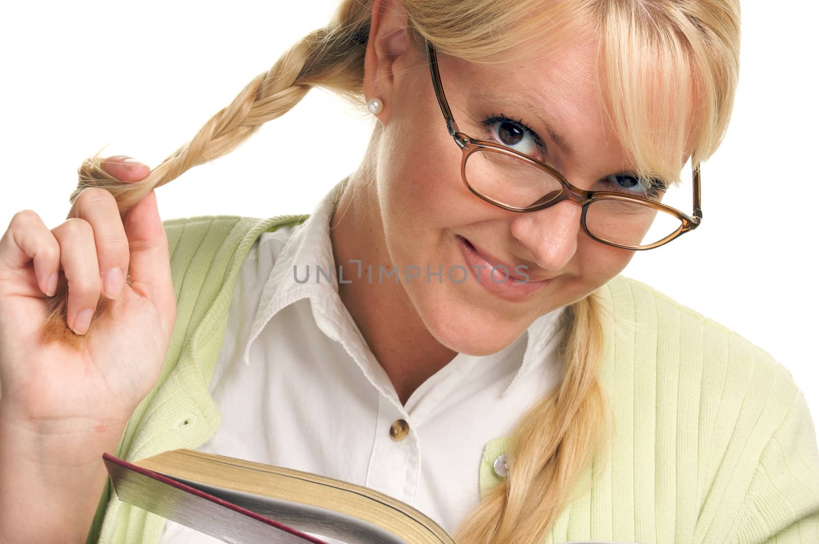 Female With Ponytails Reads Her Book isolated on a White Background.