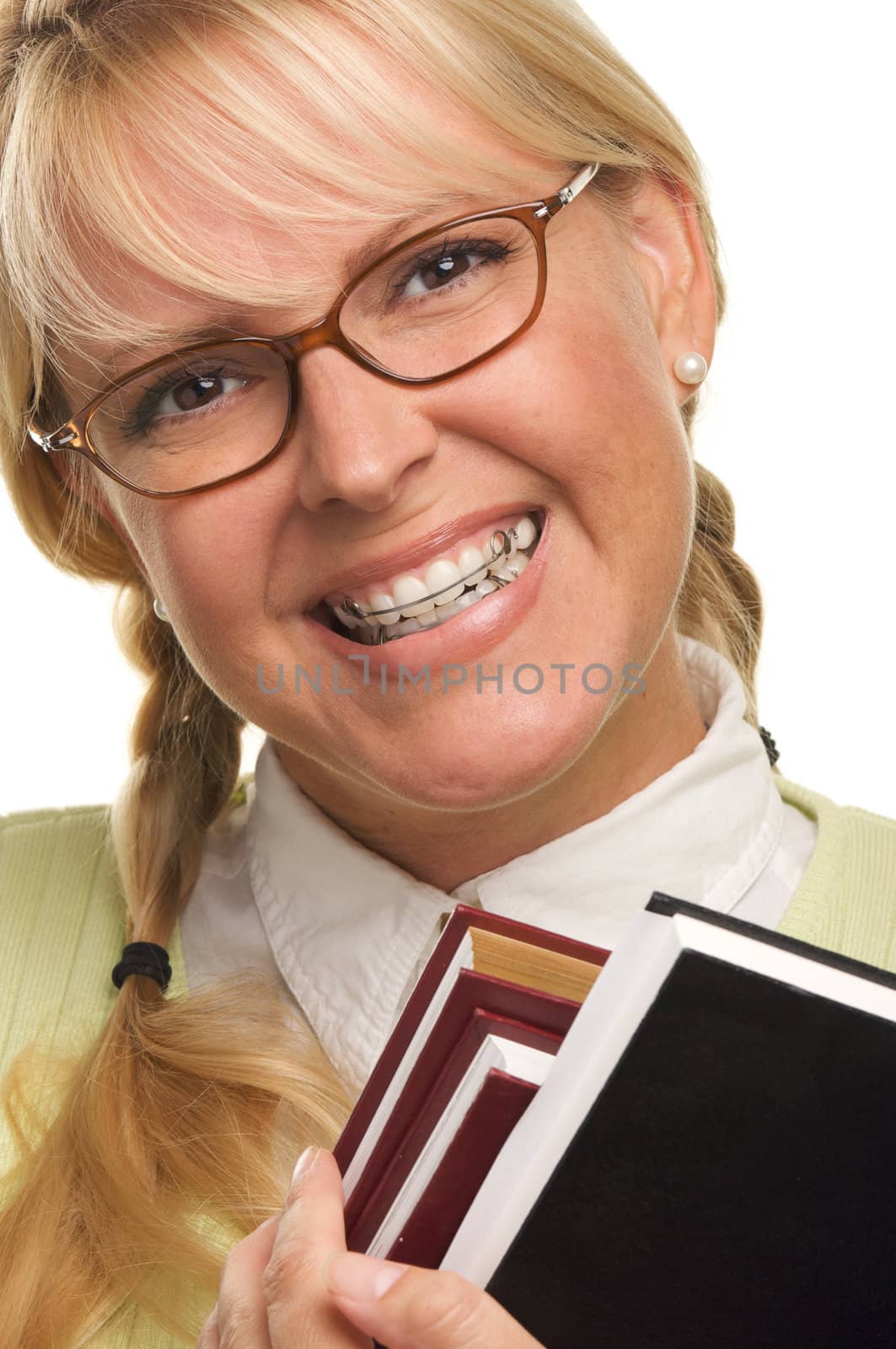 Cute Student with Retainer Carrying Her Books isolated on a White Background.