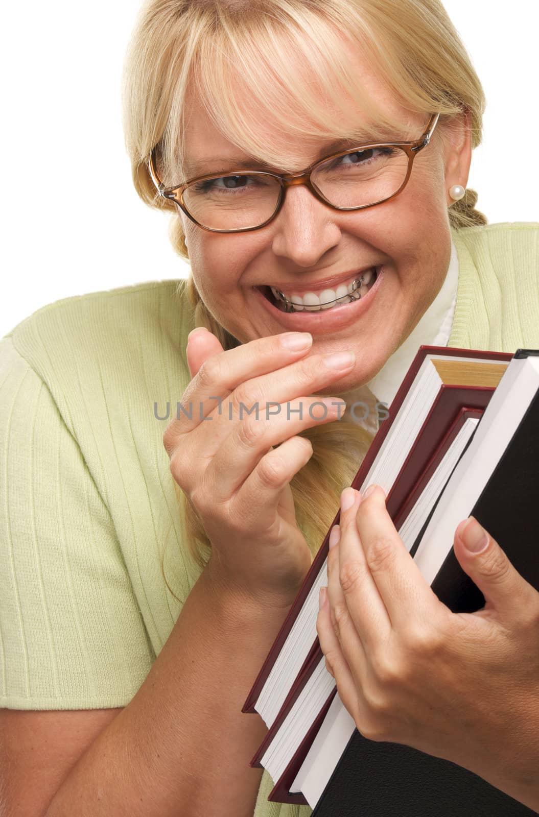 Cute Student with Retainer Carrying Her Books isolated on a White Background.