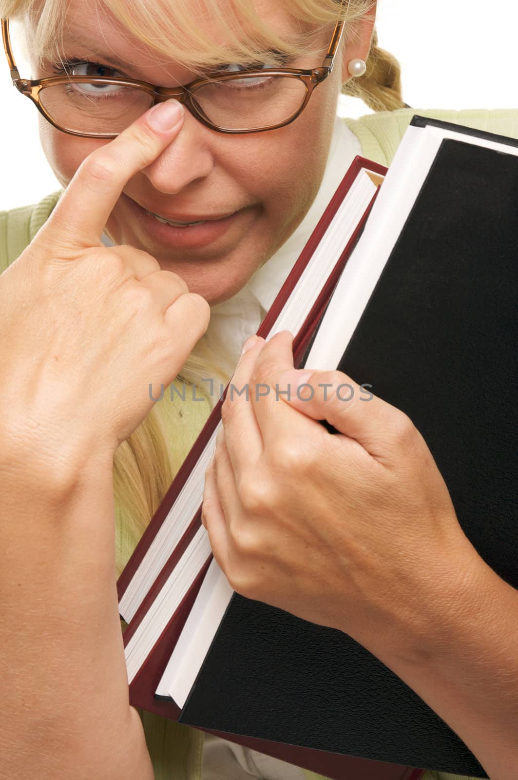 Cute Student with Retainer Carrying Her Books isolated on a White Background.