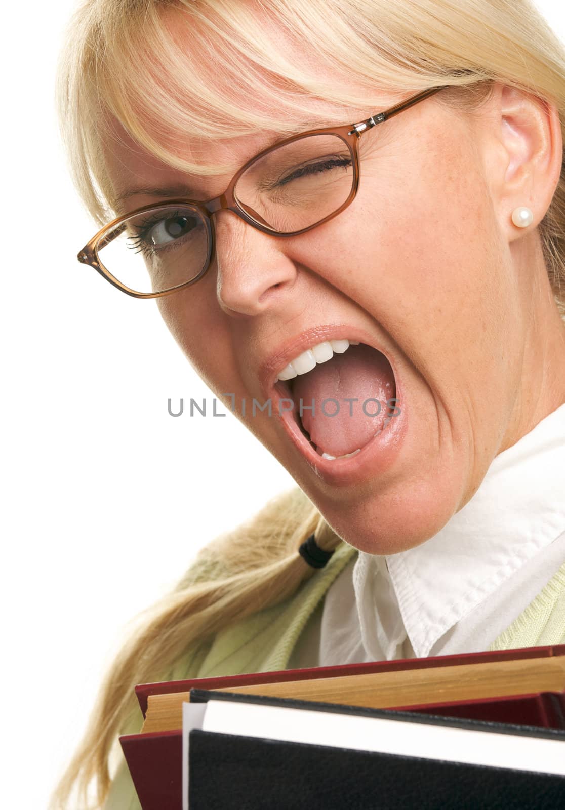 Flirtatious Attractive Student Carrying Her Books Isolated on a White Background.