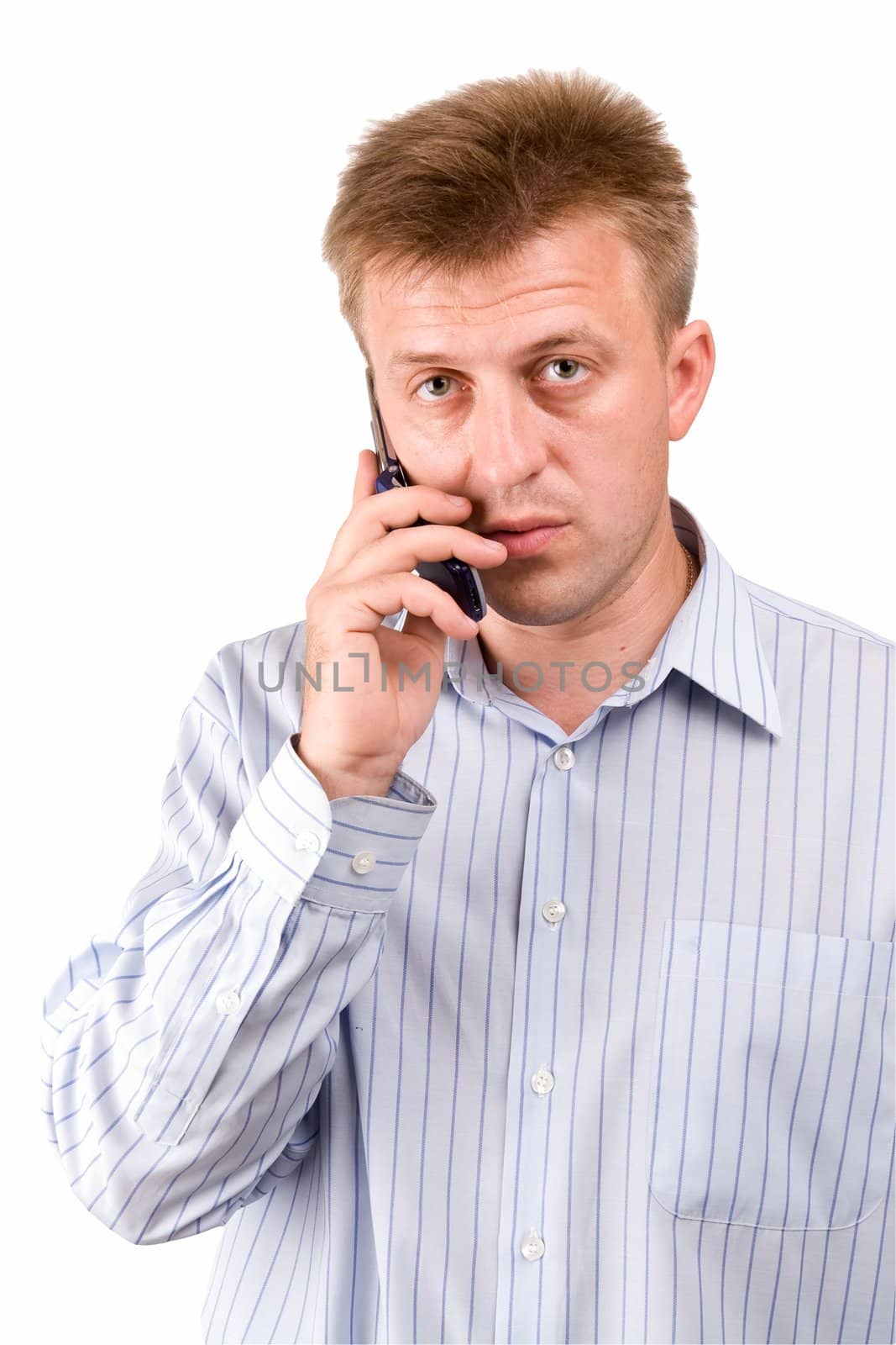 serious man with mobile phone on a white background