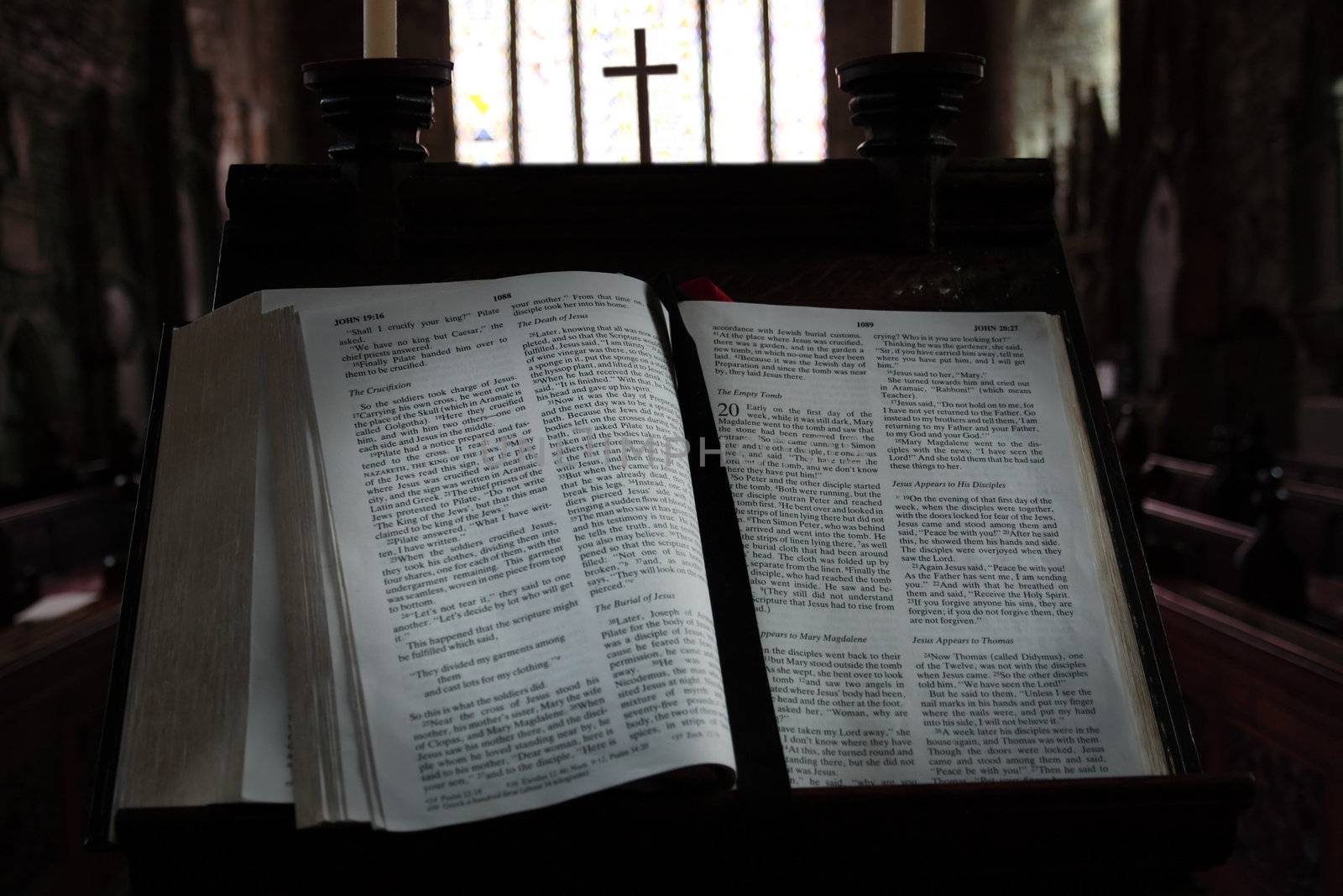 a bible on a stand in the church