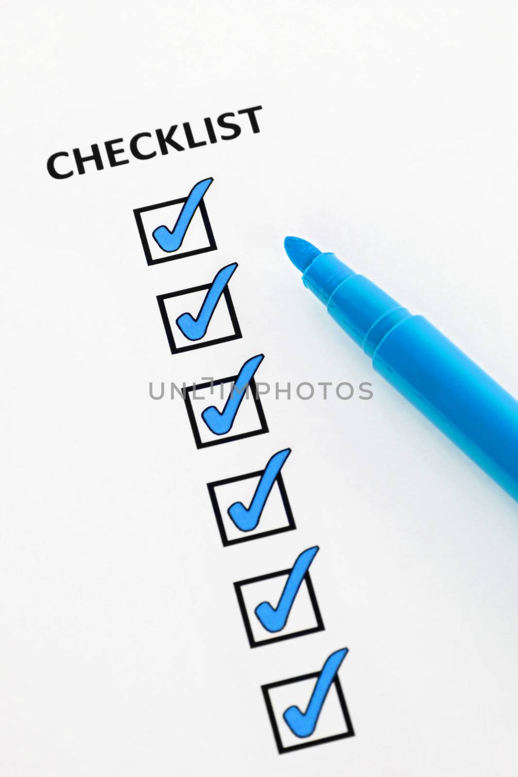 Checklist with checkboxes ticked using blue pen