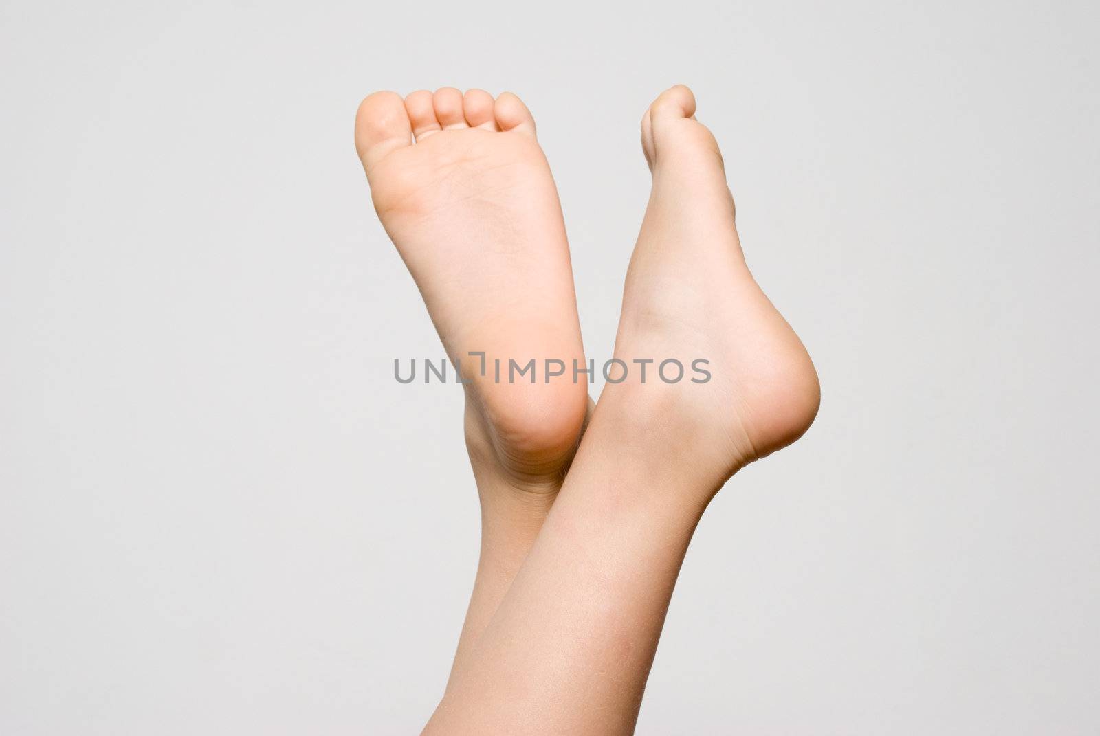 Children's feet on a light background