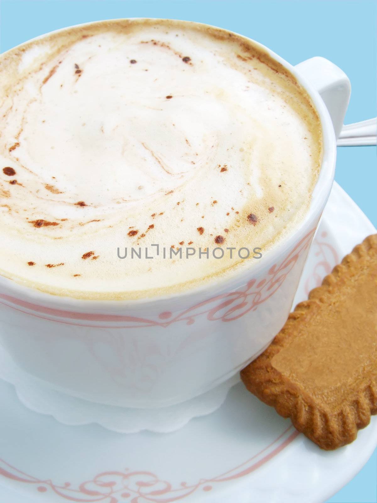 Close up of a cup of cappucino with milk