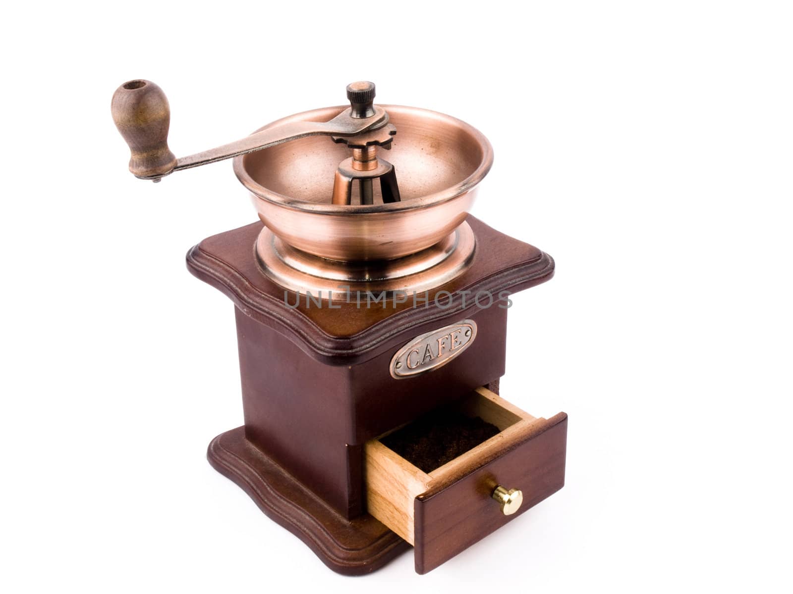 Old-fashioned coffe-mill on white background