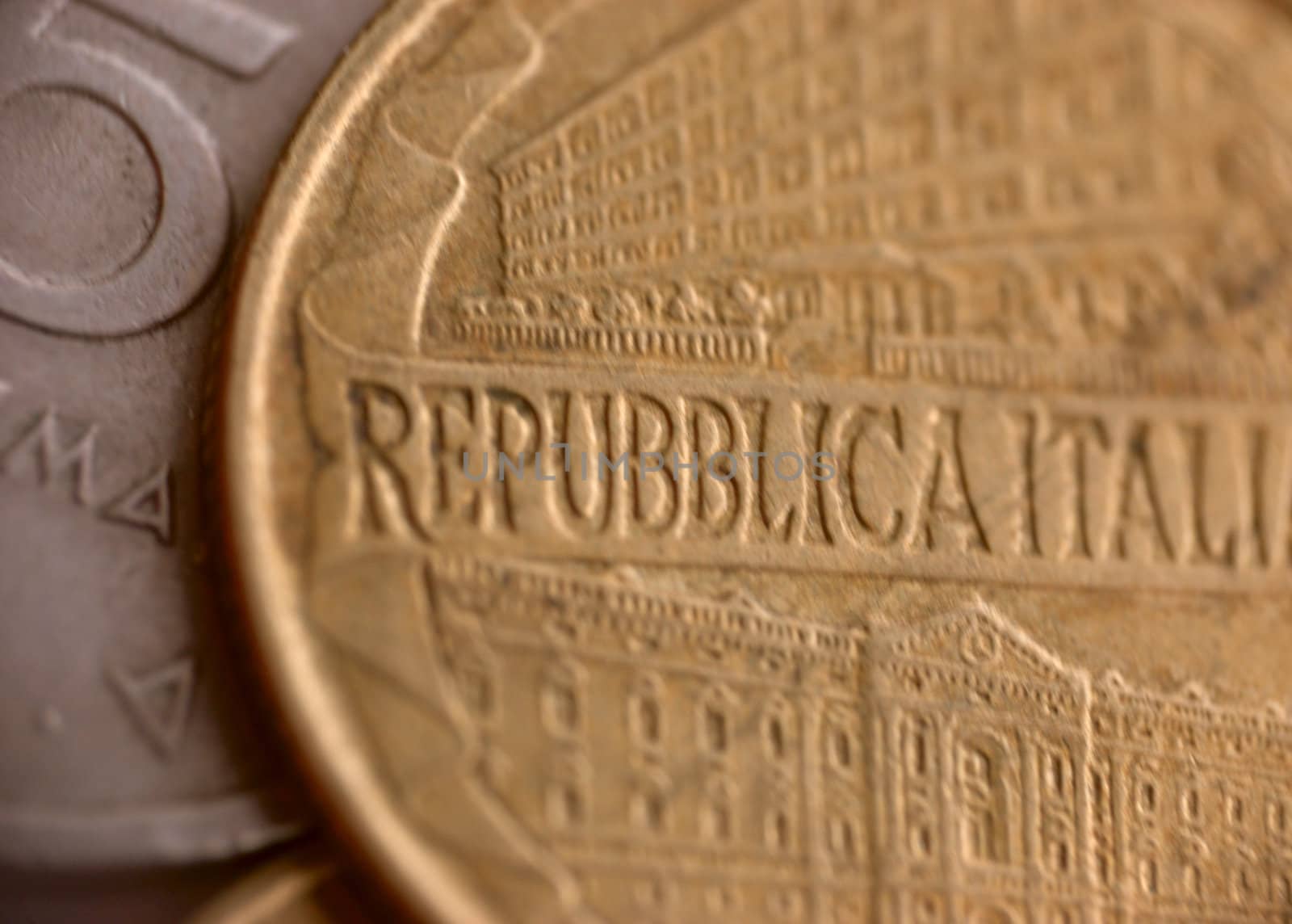 modern italian coin of gold color, macro
