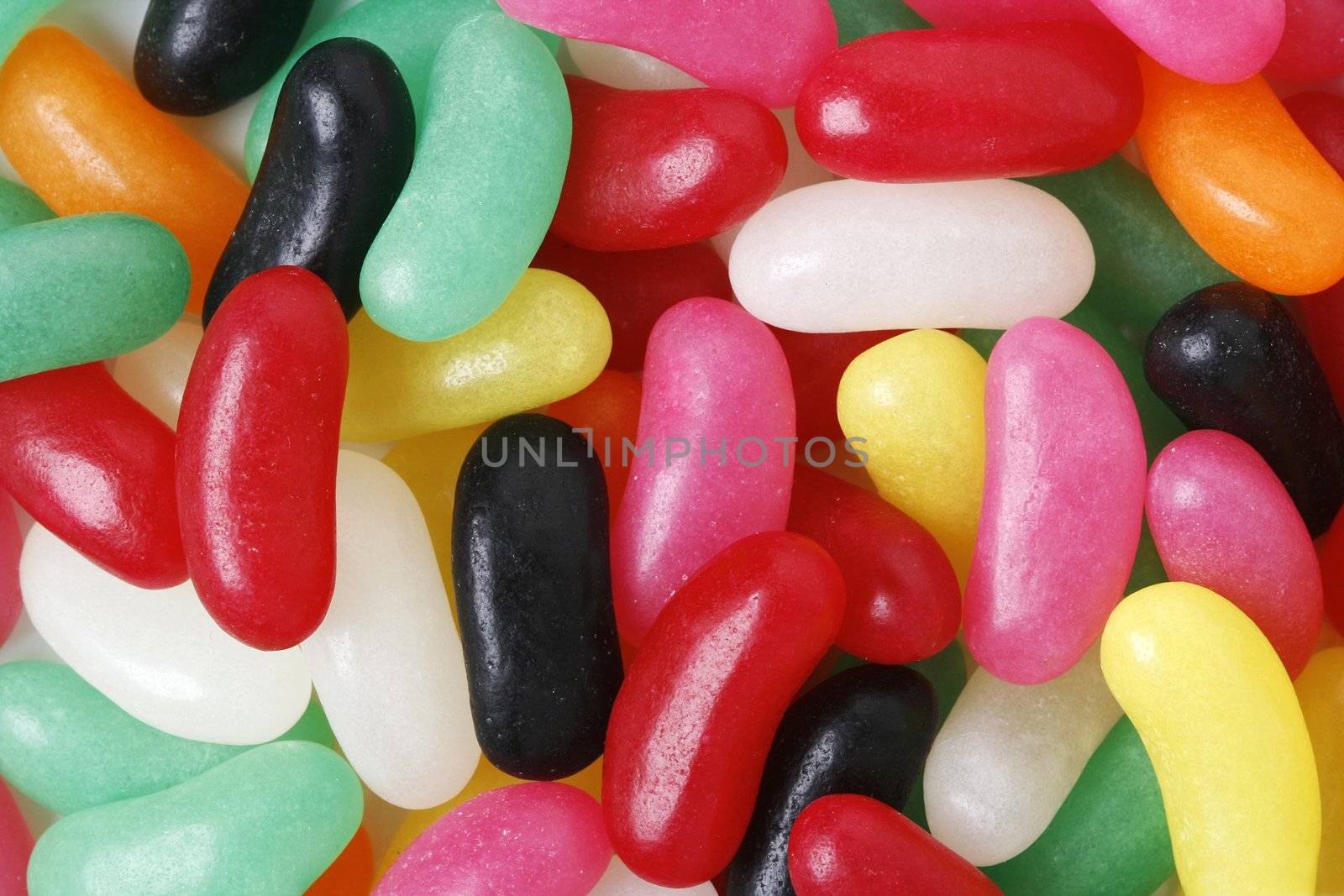 Multi colored jelly beans background close-up