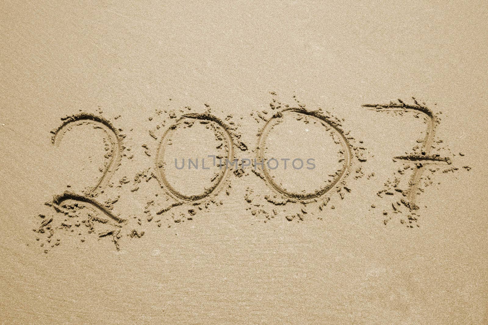 the number 2007 written in sand