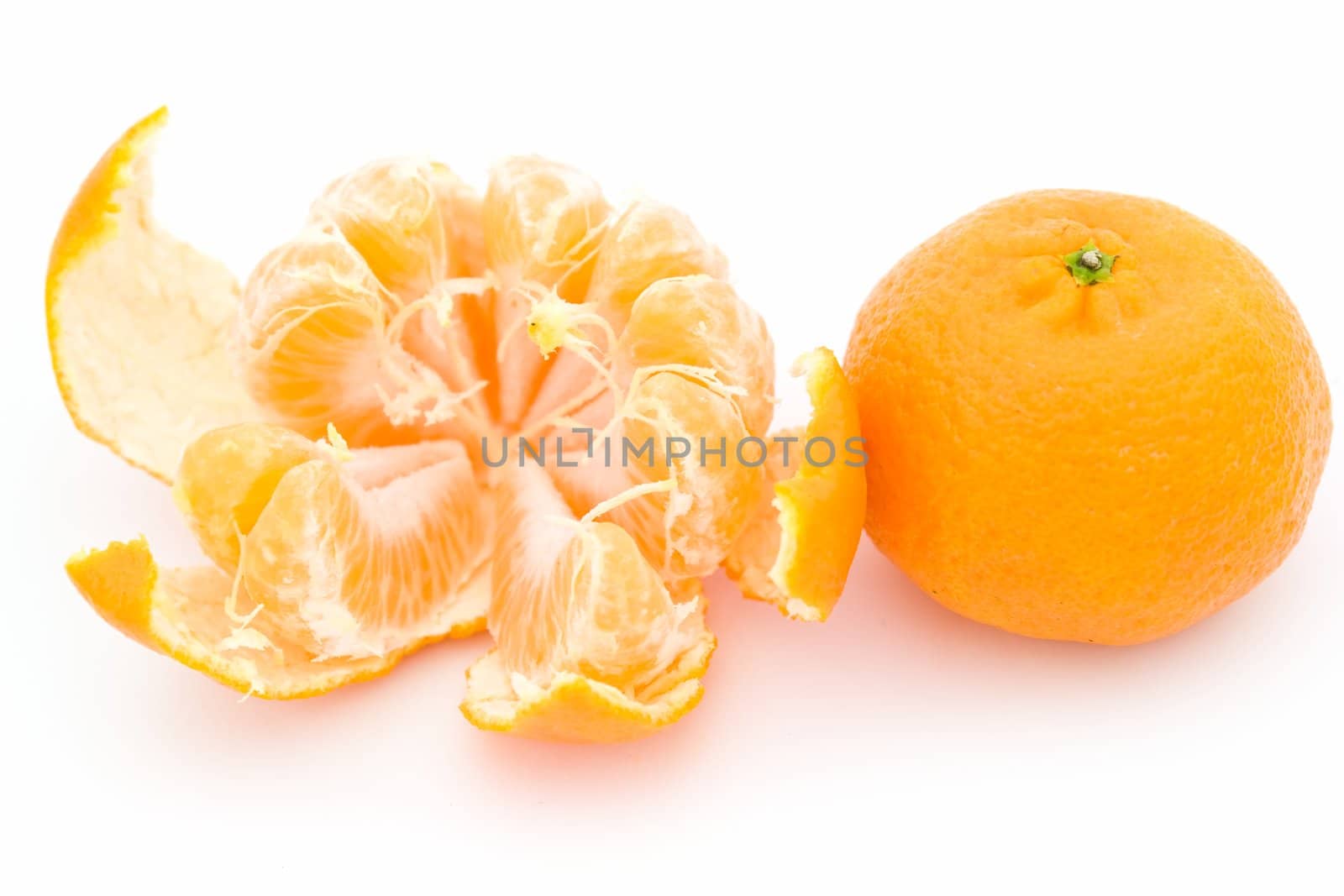 Juicy tangerines on a white background