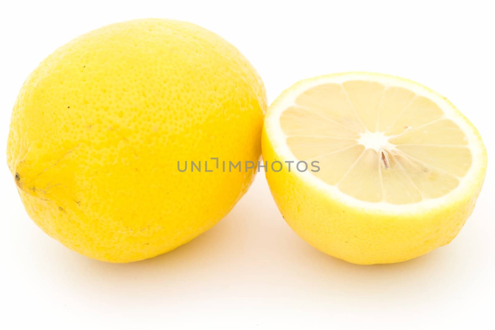 juicy yellow lemons on a white background