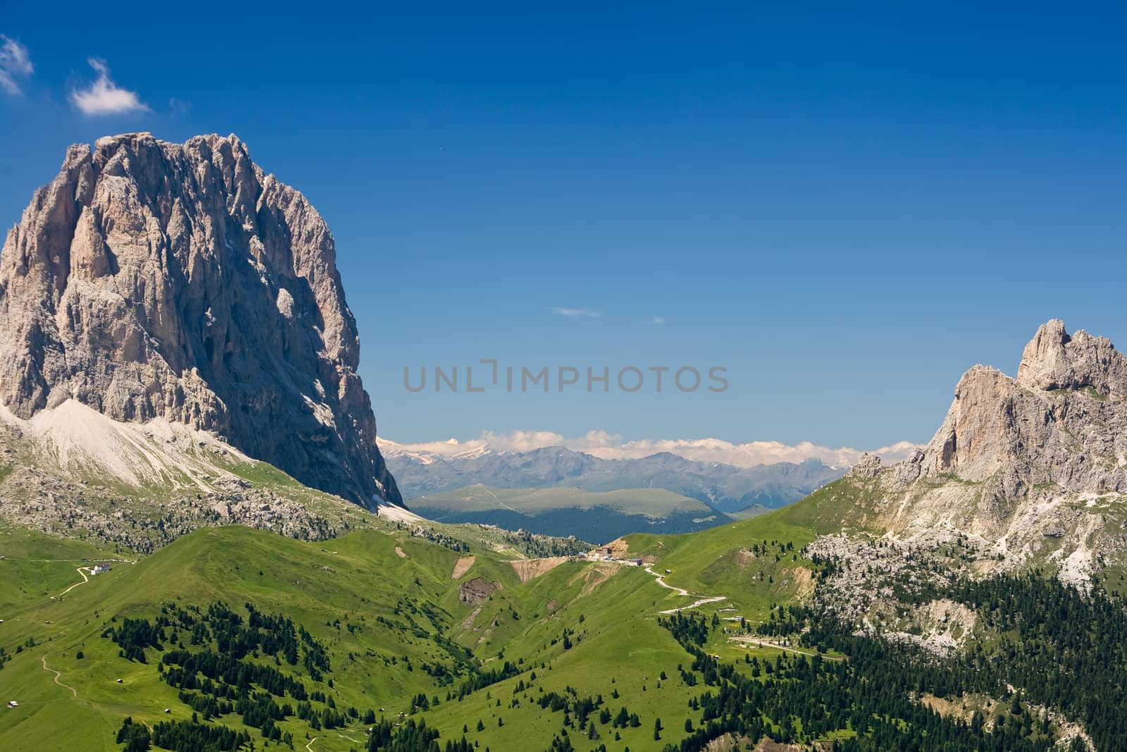 Summer view of Sella pass with Sassolungo mountain, Italy