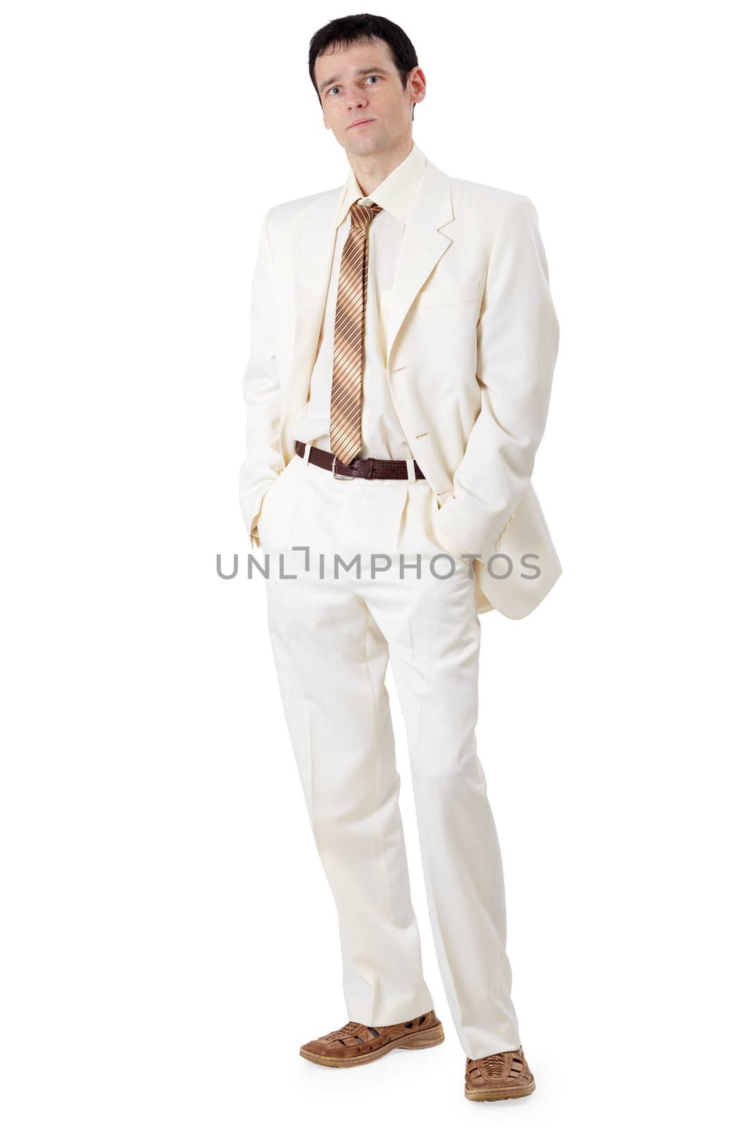 A young handsome businessman in a white suit