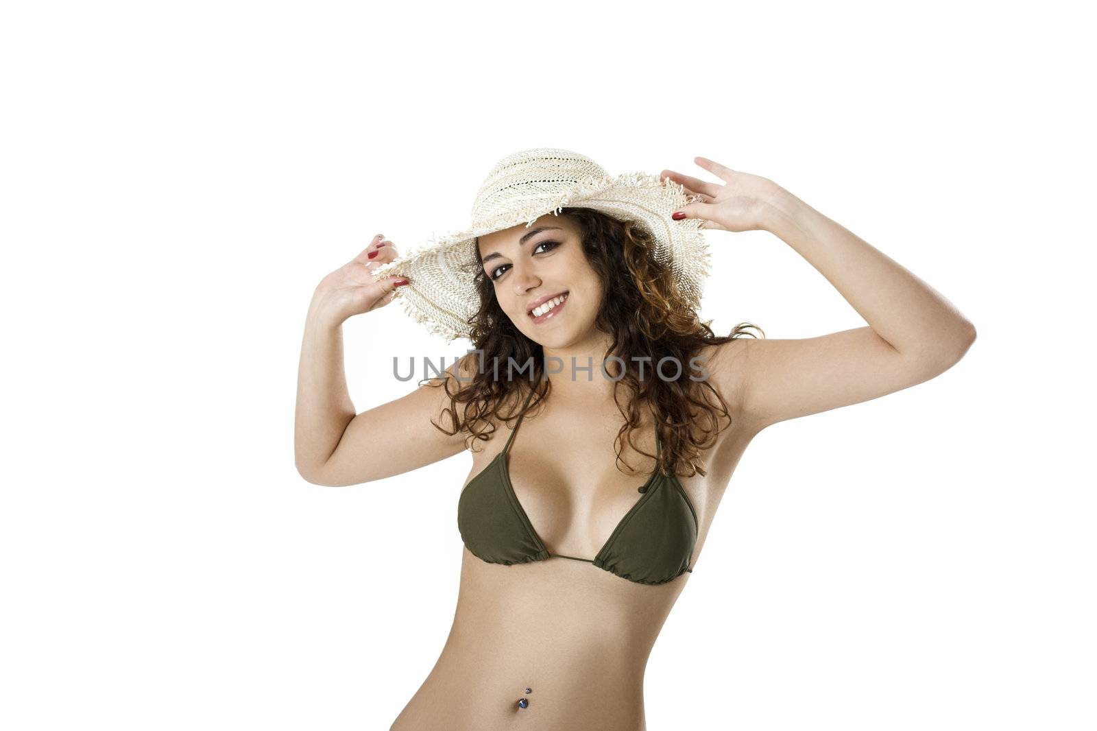 Portrait of a beautiful young woman in bikini posing on a white background