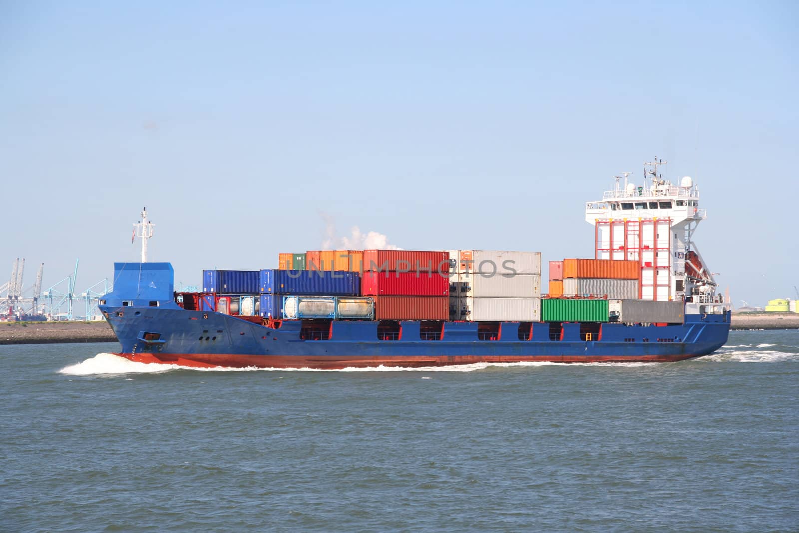 Container ship arriving at the harbor